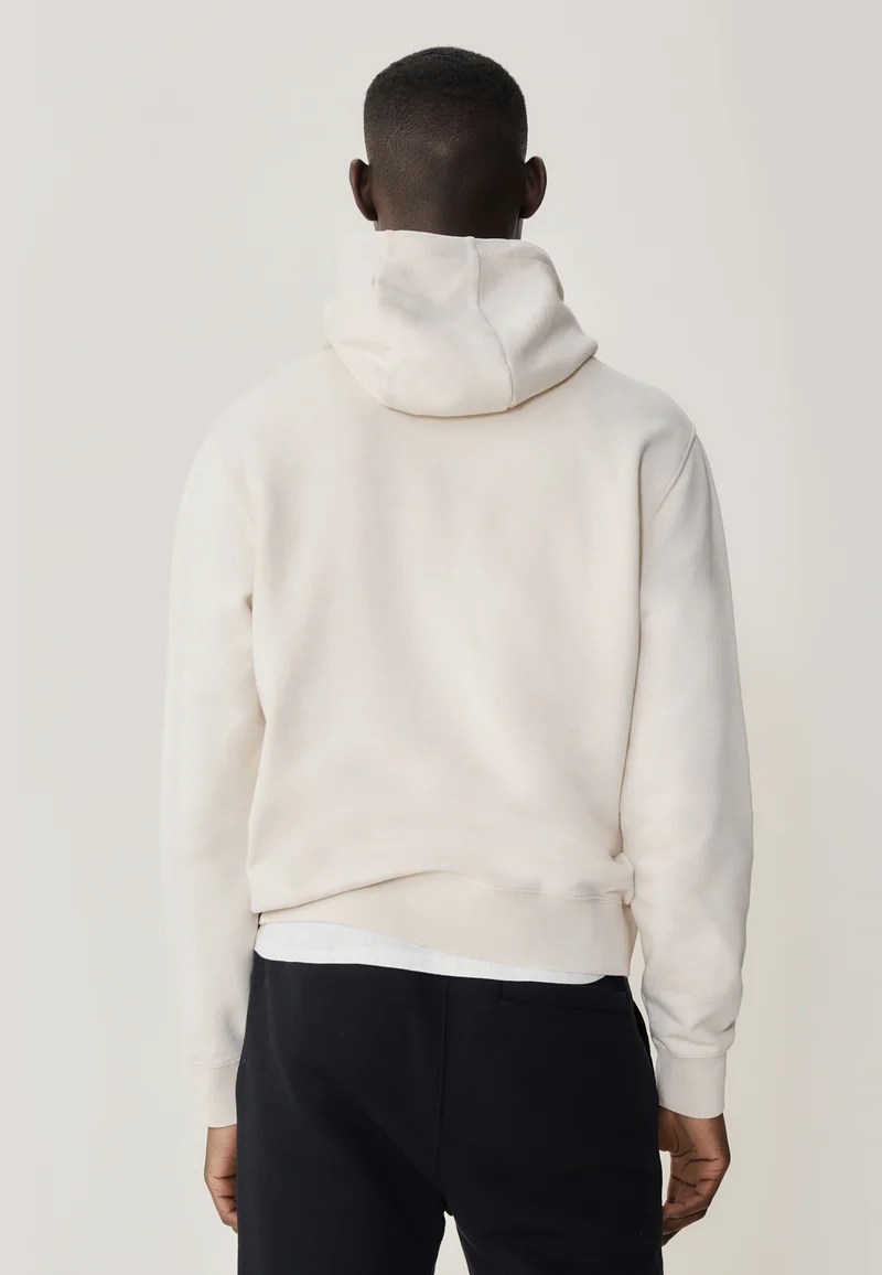 Le sweat à capuche