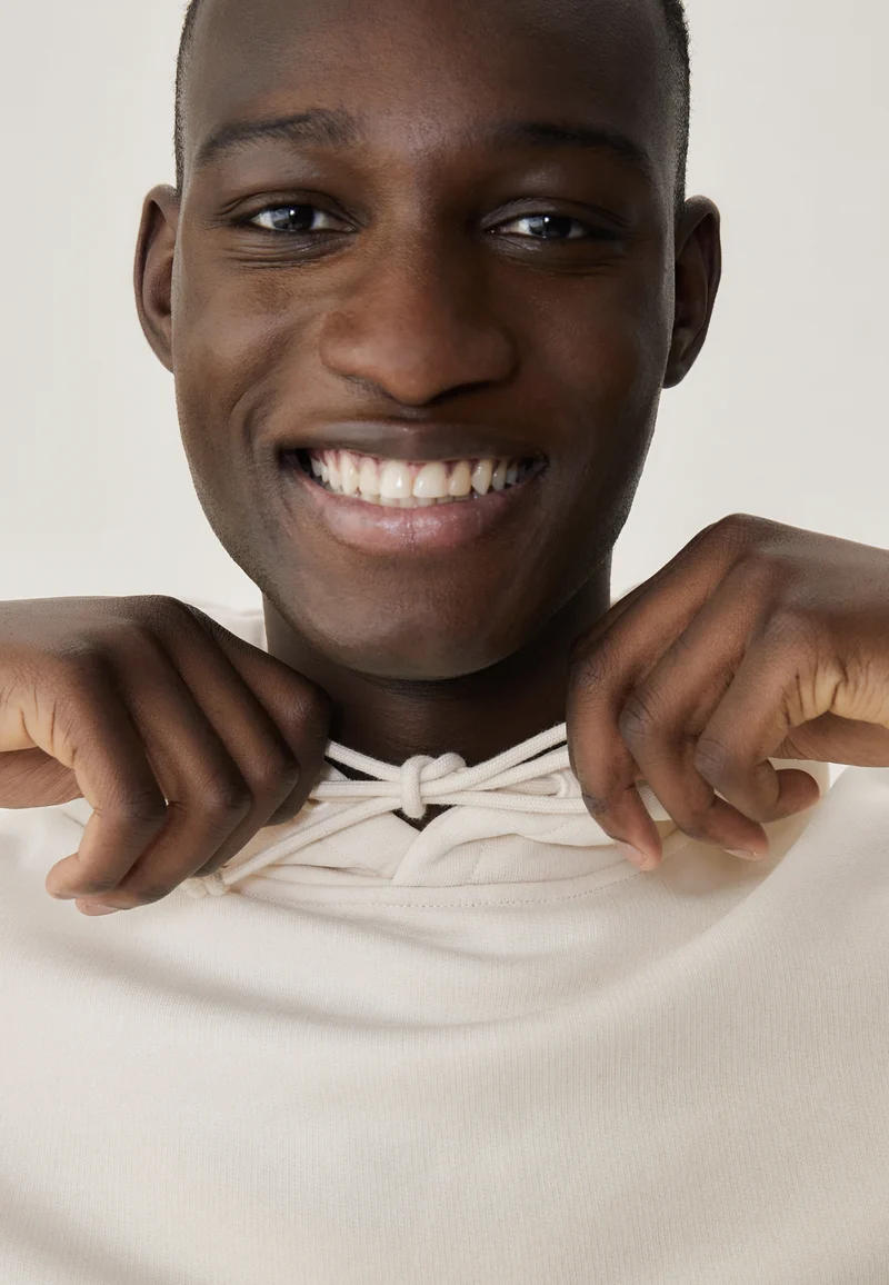 Le sweat à capuche