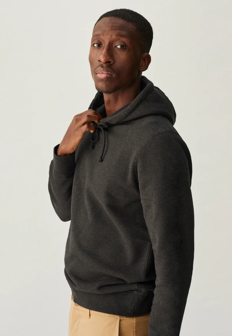 Le sweat à capuche