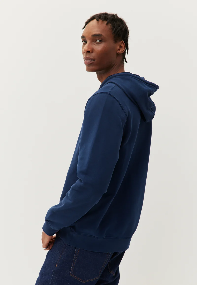 Le sweat à capuche