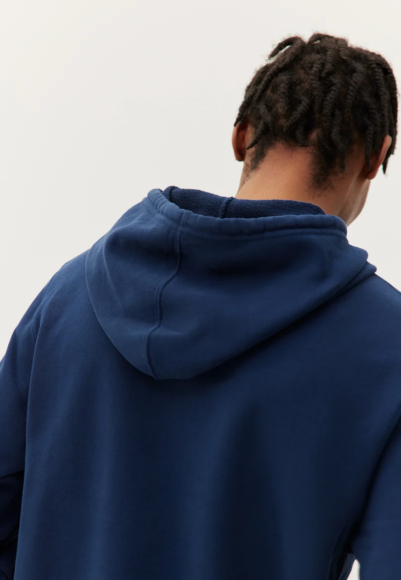 Le sweat à capuche