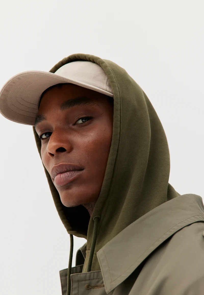 Le sweat à capuche