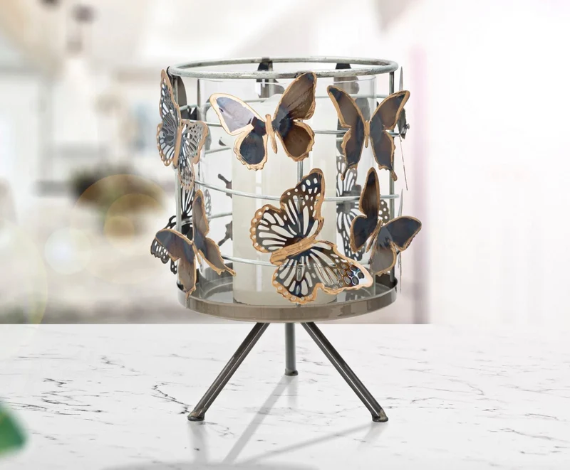 Bougeoir rond en métal avec papillon glamour