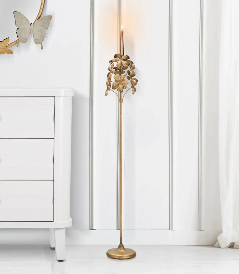 Bougeoir sur pied en métal doré au design floral