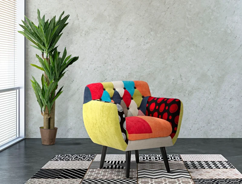 Chaise à accoudoirs colorée pour salle de jeux d’enfants