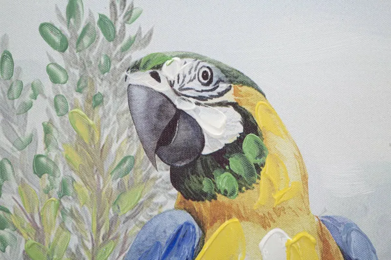 Peinture finition à la main représentant une femme africaine dans la jungle avec un perroquet