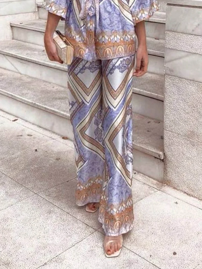 Elegant Unique Pattern Printed Belted Loose Lapel Top