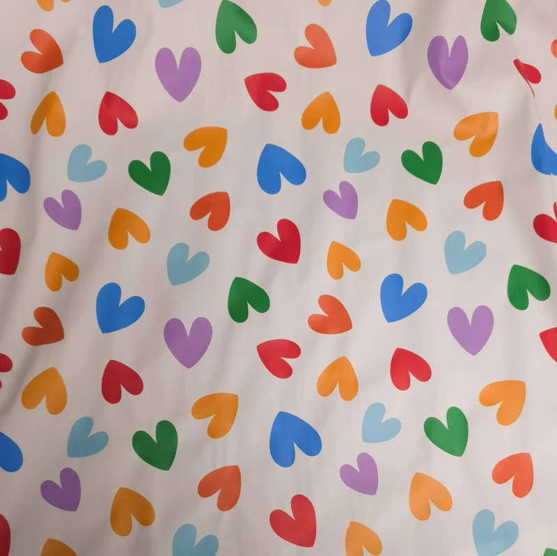 Tissu Imperméable | Cœurs Multicolores sur Écru | Certifié Oeko-Tex
