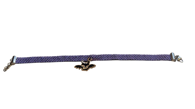 Bracelet Tissé Violet & Breloque Chauve-Souris