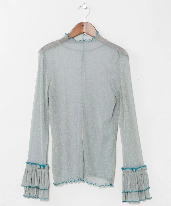 Haut extensible transparent à paillettes dorées