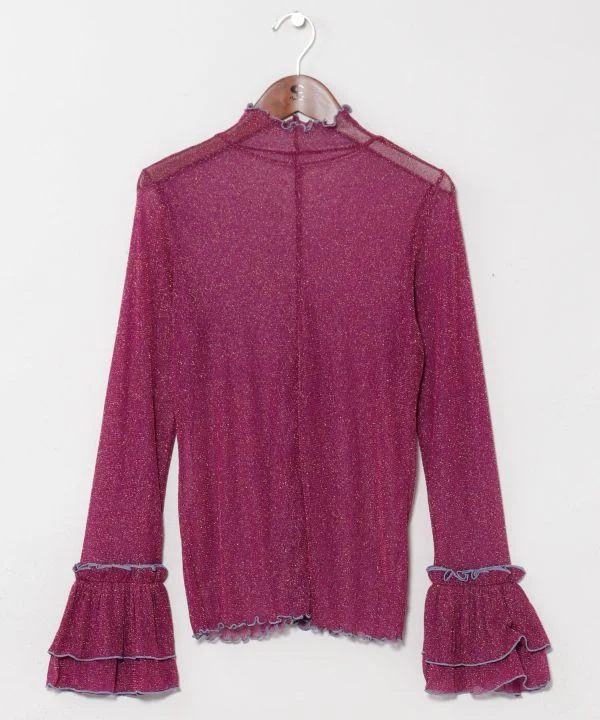 Haut extensible transparent à paillettes dorées