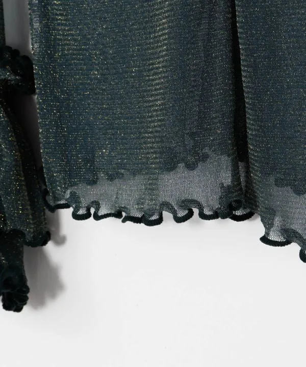 Haut extensible transparent à paillettes dorées