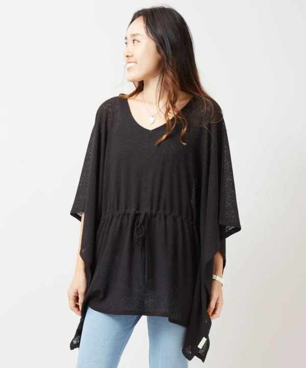 Haut en maille à texture transparente et ceinture nouée à la taille