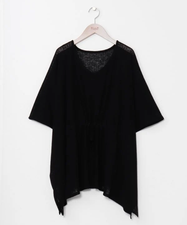 Haut en maille à texture transparente et ceinture nouée à la taille