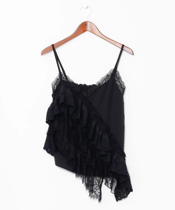Haut asymétrique en textile superposé