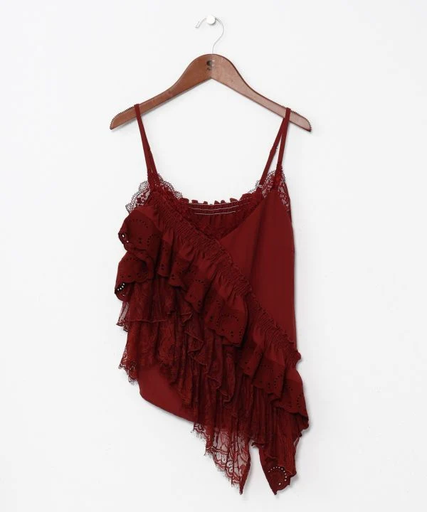 Haut asymétrique en textile superposé
