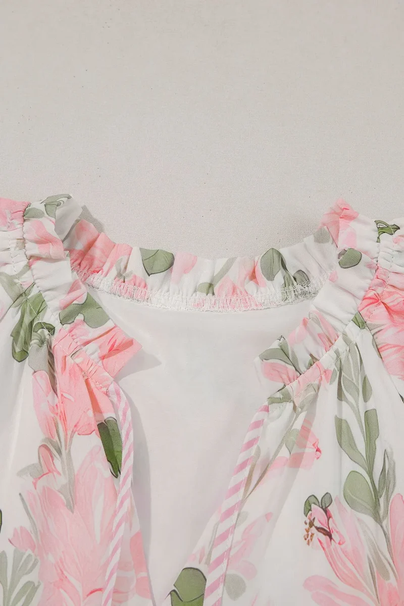 Mini-robe à manches courtes et bordures contrastées à fleurs