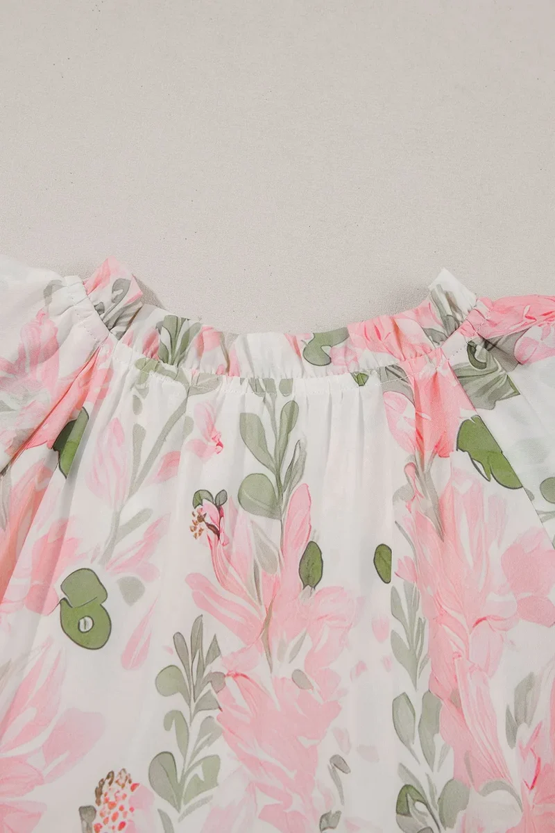 Mini-robe à manches courtes et bordures contrastées à fleurs