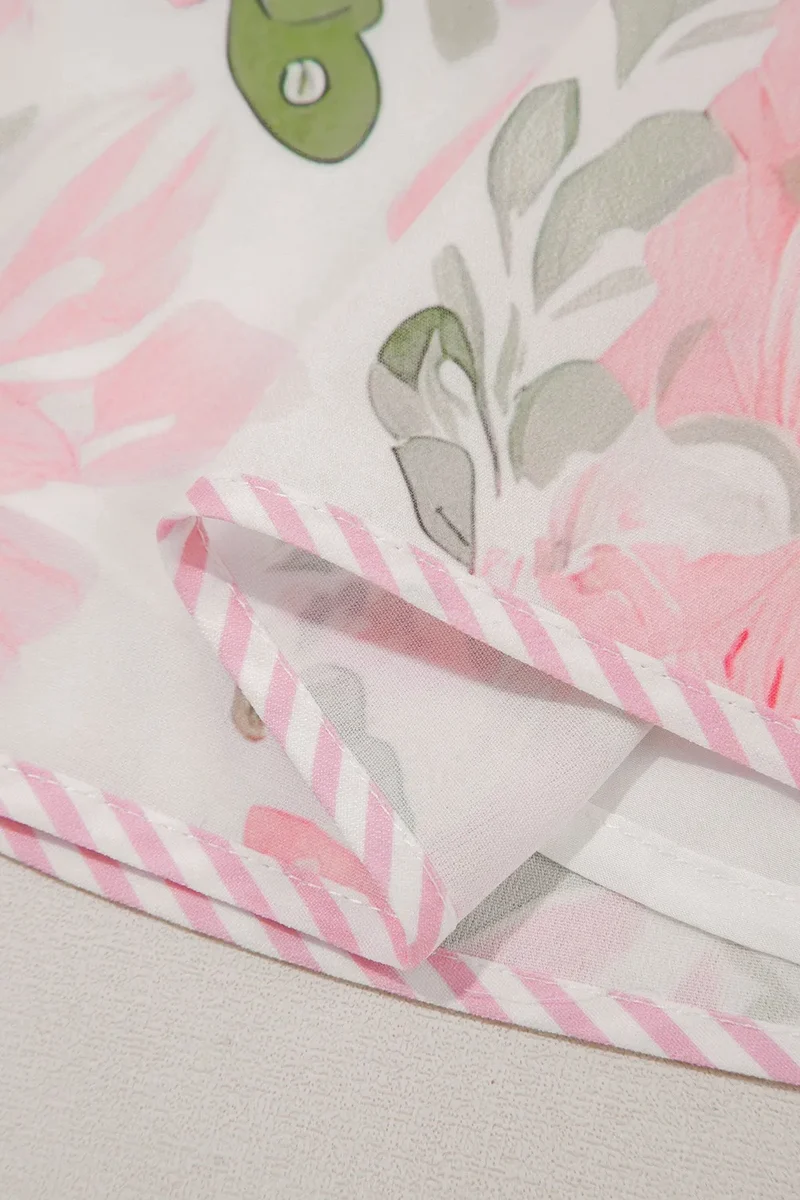 Mini-robe à manches courtes et bordures contrastées à fleurs