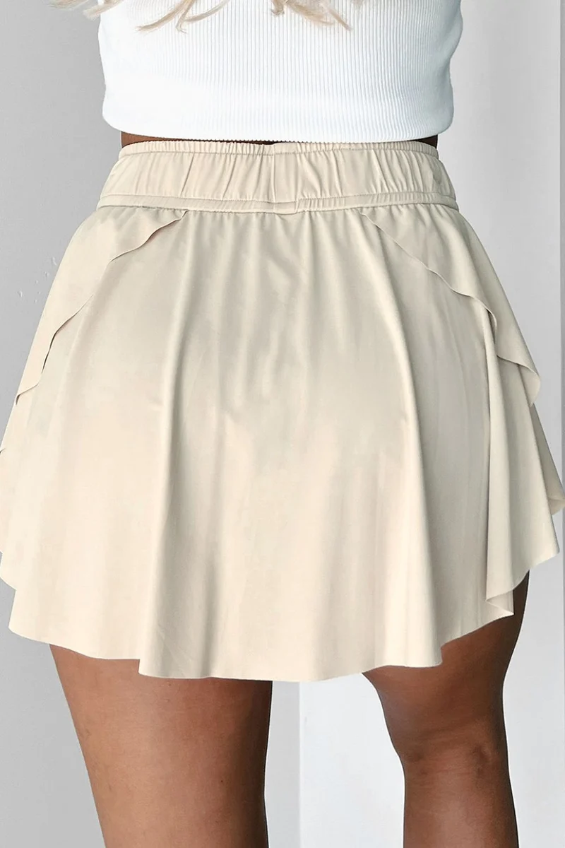Jupe-short de sport doublée taille haute avec cordon de serrage