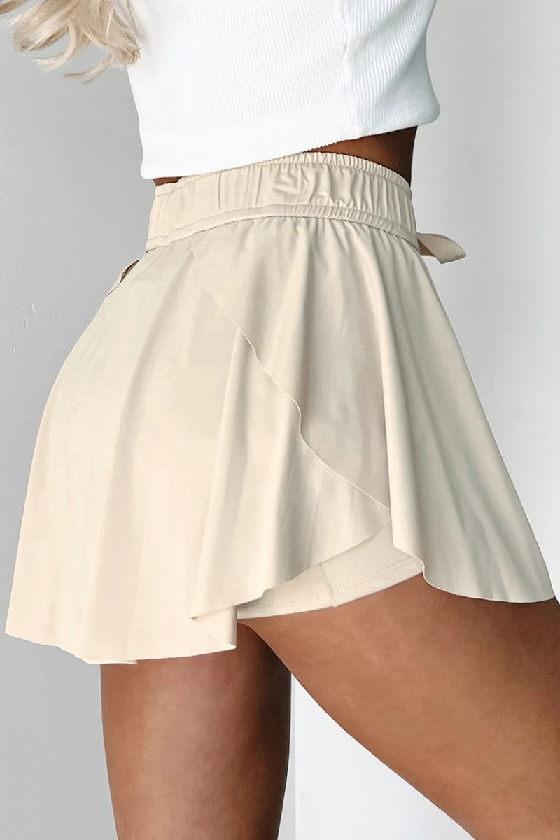 Jupe-short de sport doublée taille haute avec cordon de serrage