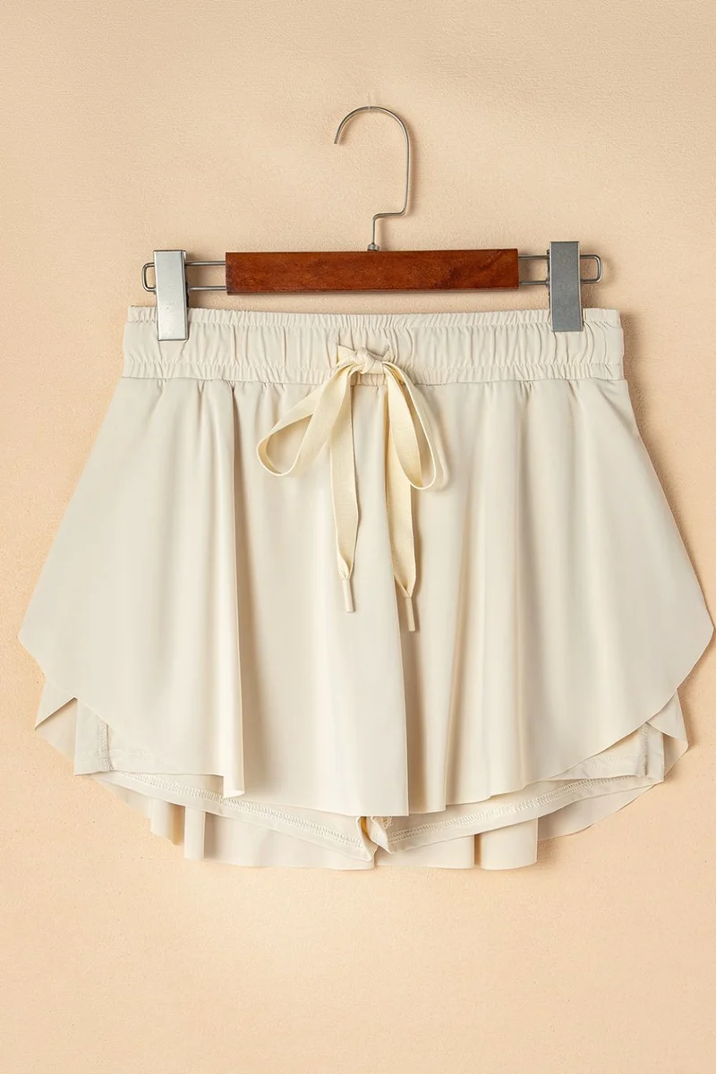 Jupe-short de sport doublée taille haute avec cordon de serrage