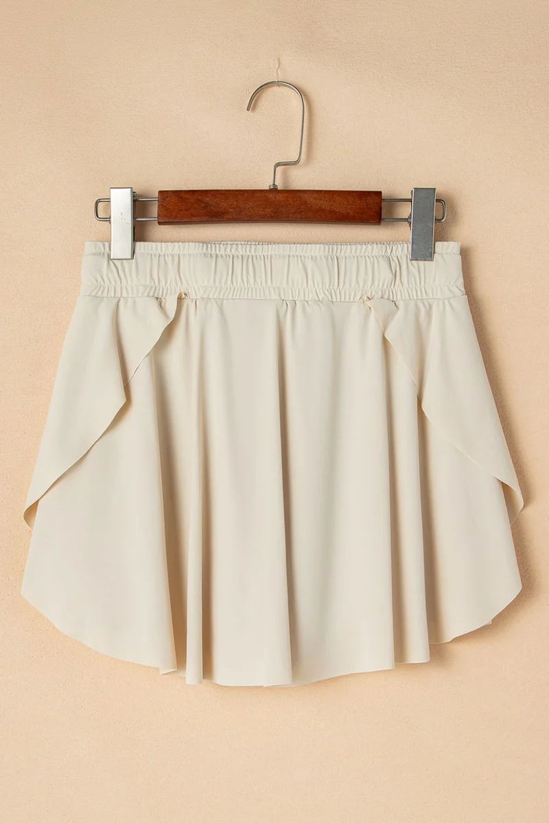 Jupe-short de sport doublée taille haute avec cordon de serrage
