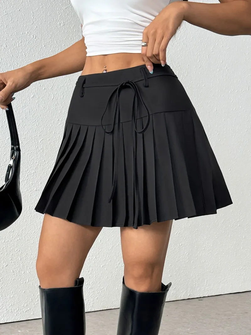 Mini-jupe plissée nouée