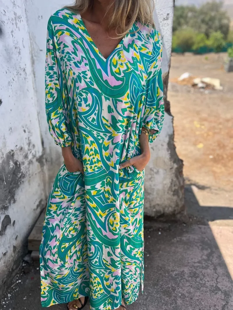 Robe imprimée à col en V et poches, grande taille
