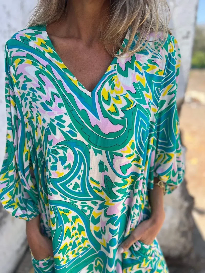 Robe imprimée à col en V et poches, grande taille