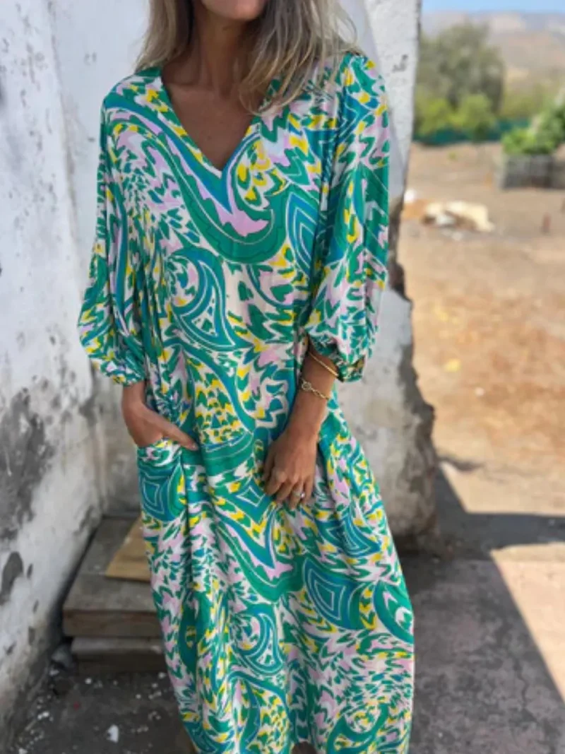 Robe imprimée à col en V et poches, grande taille