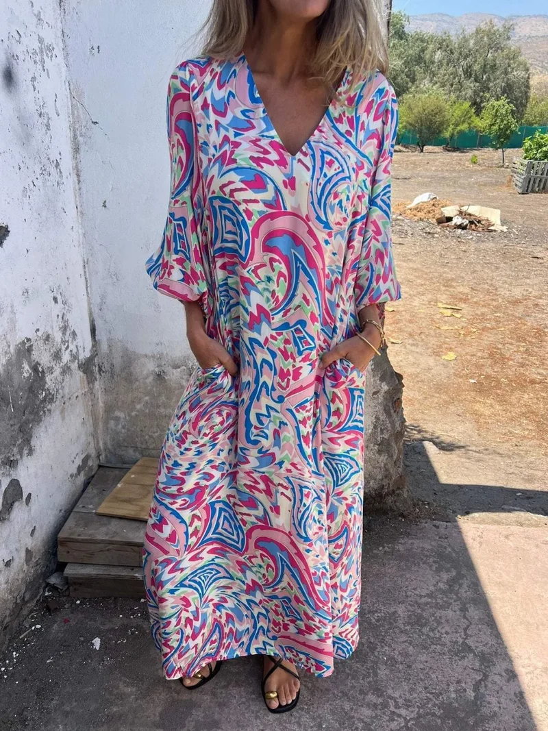 Robe imprimée à col en V et poches, grande taille