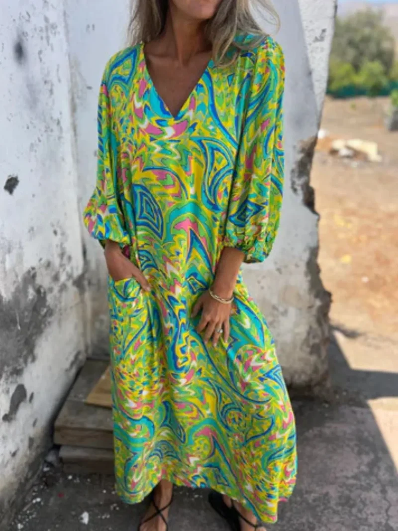 Robe imprimée à col en V et poches, grande taille