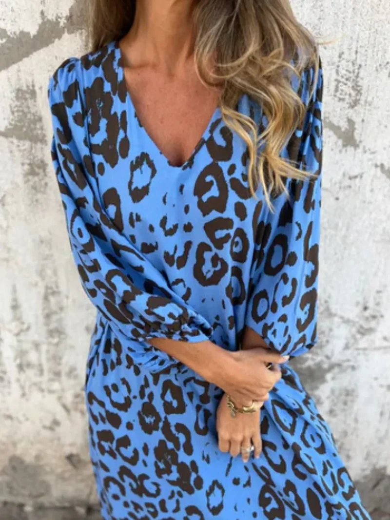 Robe imprimée à col en V et poches, grande taille