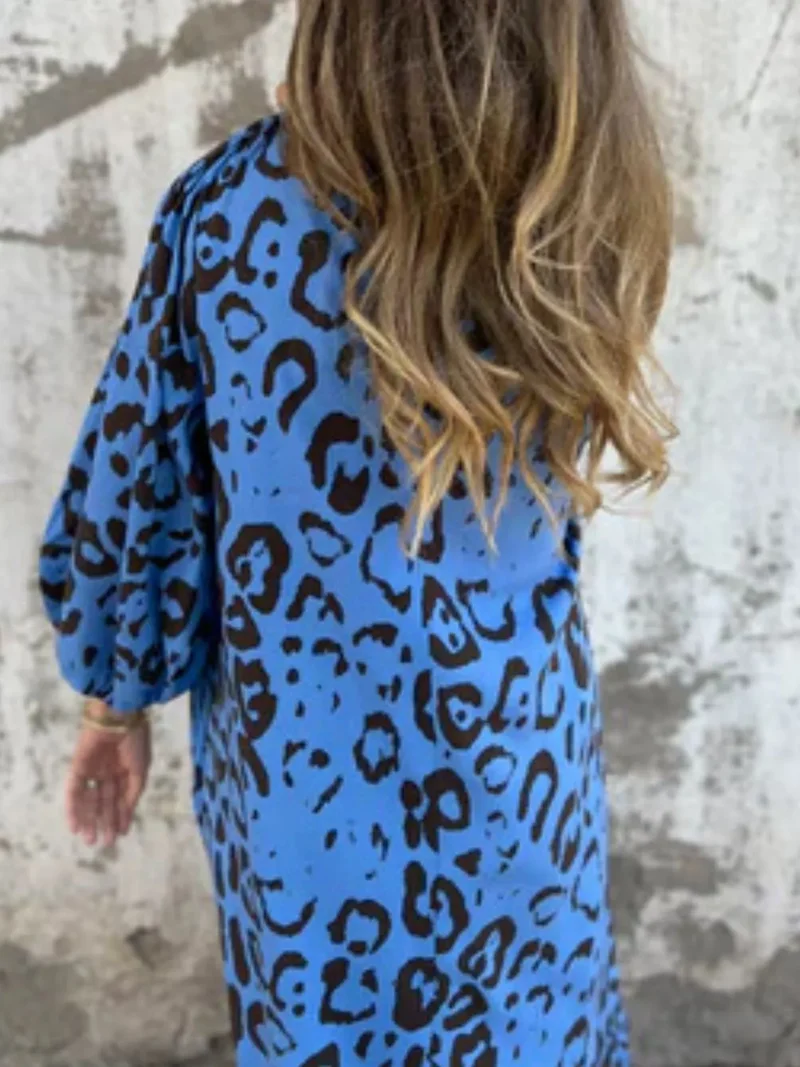 Robe imprimée à col en V et poches, grande taille