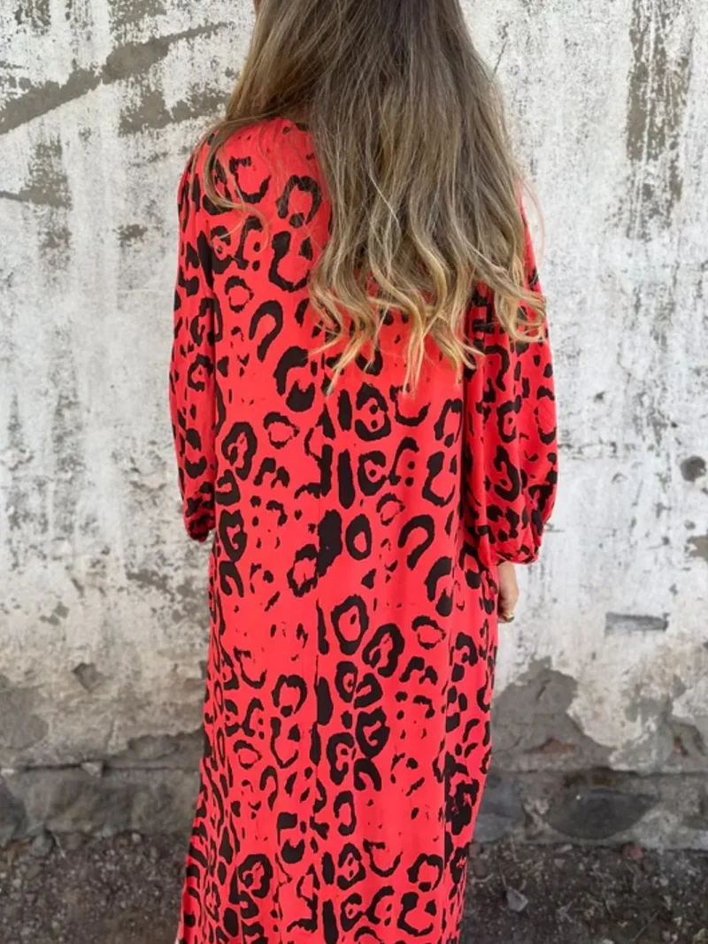 Robe imprimée à col en V et poches, grande taille