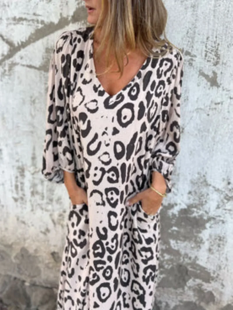 Robe imprimée à col en V et poches, grande taille