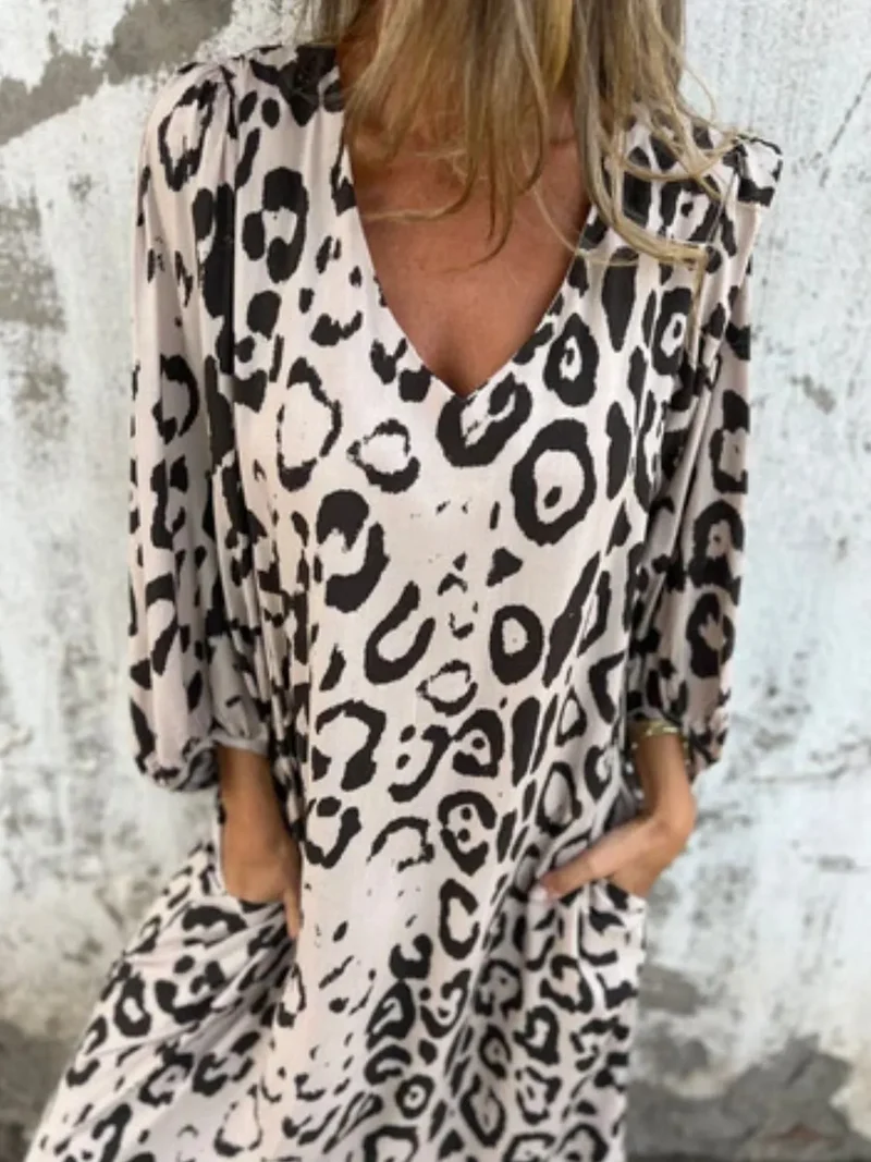 Robe imprimée à col en V et poches, grande taille