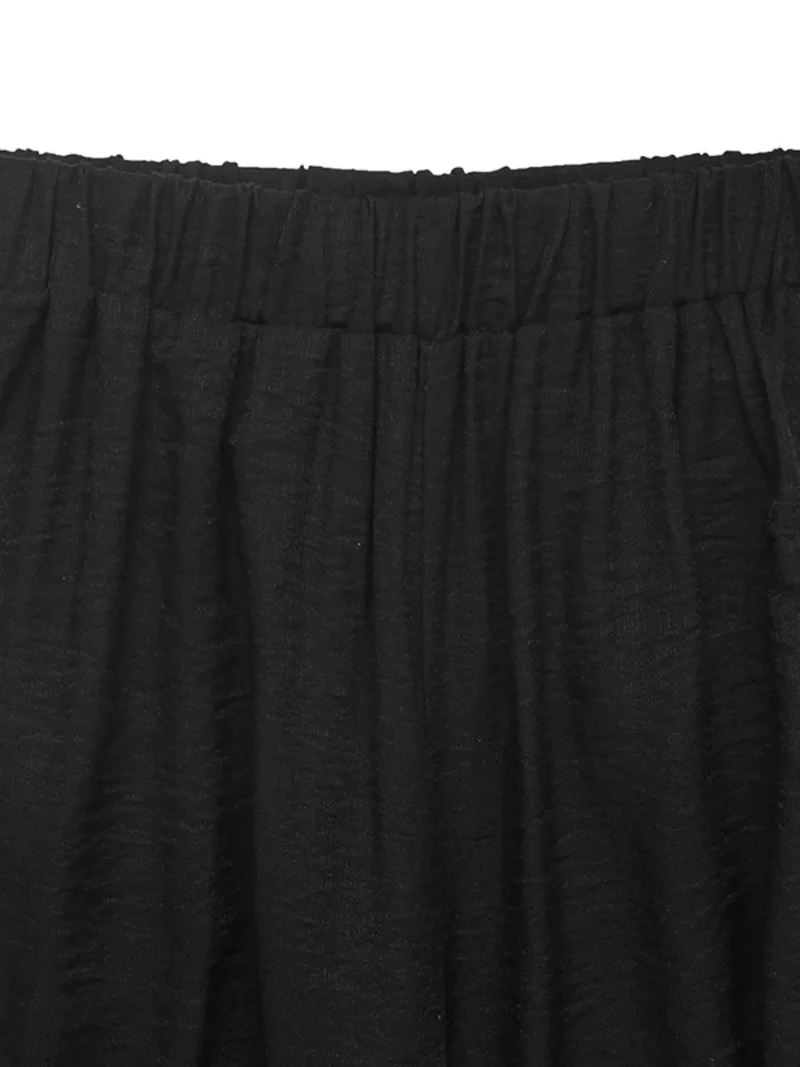 Ensemble haut sans manches et pantalon à col rond