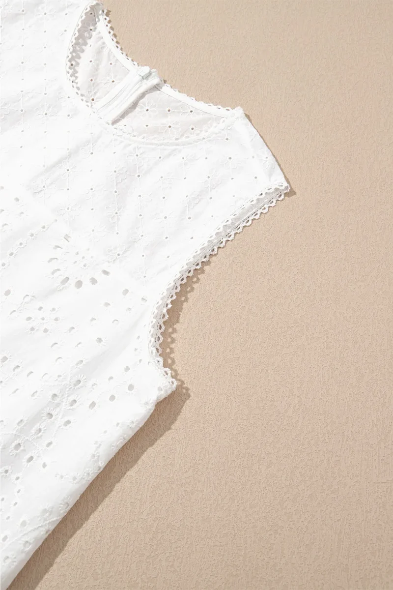 Robe droite sans manches brodée de fleurs à œillets