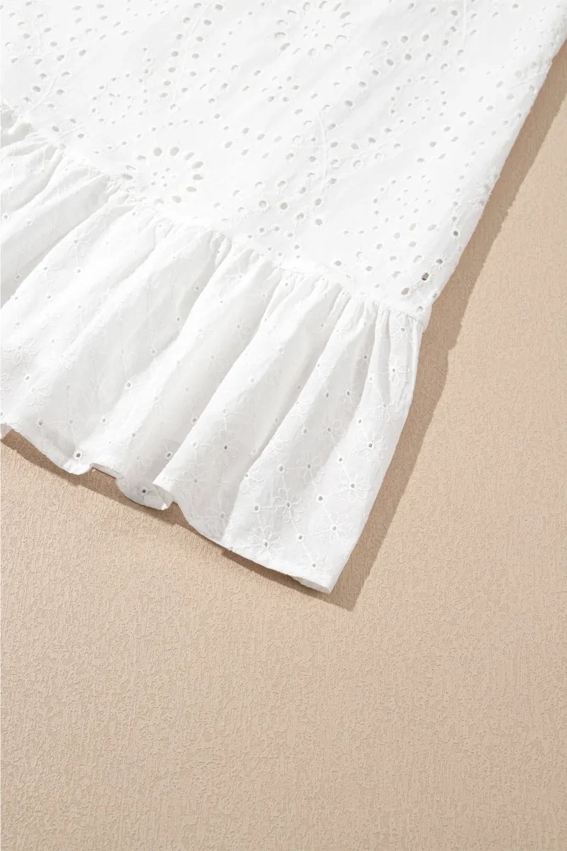 Robe droite sans manches brodée de fleurs à œillets