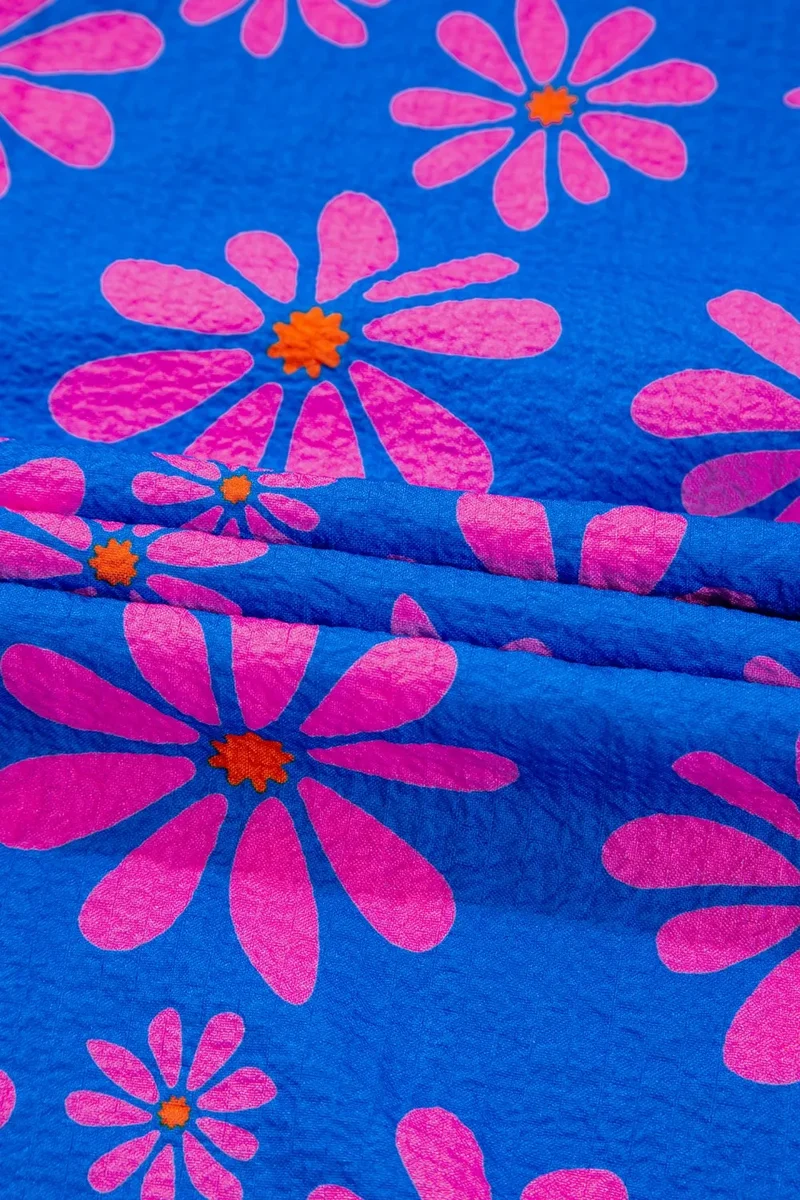 Débardeur fluide à bretelles flottantes et à imprimé floral