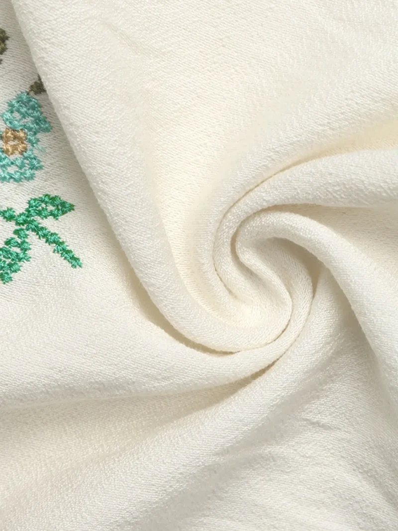 Chemise à manches courtes et col en V brodée