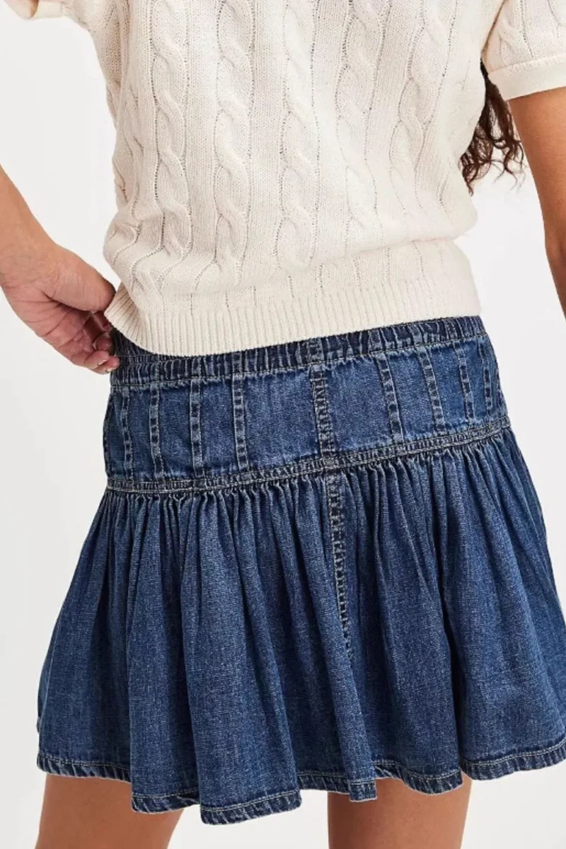 Mini-jupe en jean boutonnée à volants