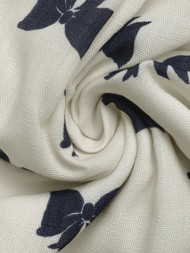 Robe à imprimé nœud et épaules nouées