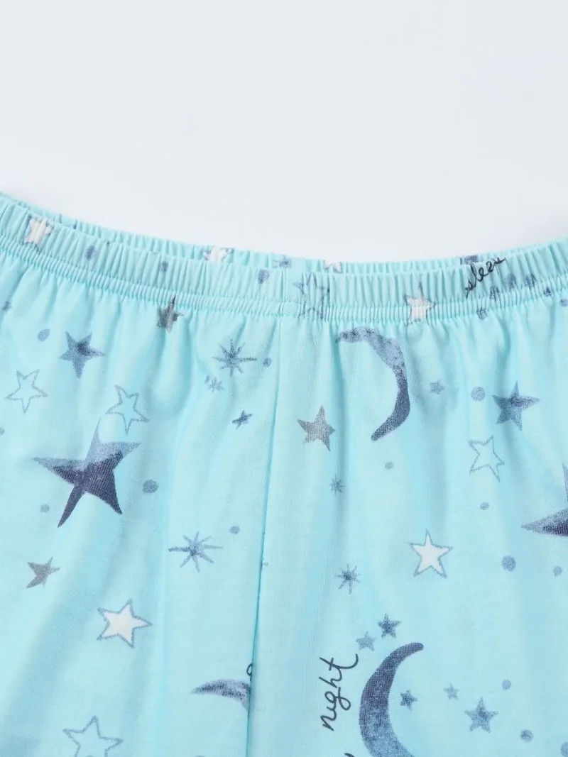 Ensemble de détente imprimé haut à col rond et short