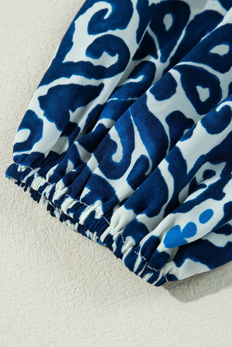Robe imprimée à manches longues et col noué