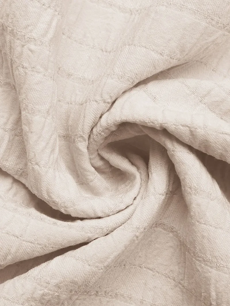 Robe sans manches à col noué et ourlet à volants