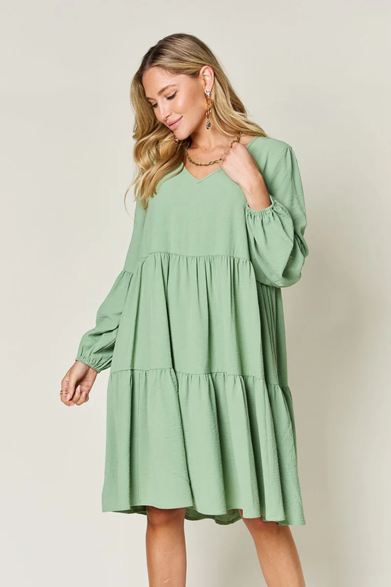 Robe à volants et manches ballon à col en V avec poches