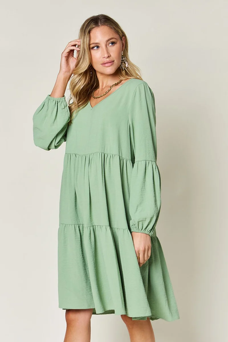 Robe à volants et manches ballon à col en V avec poches